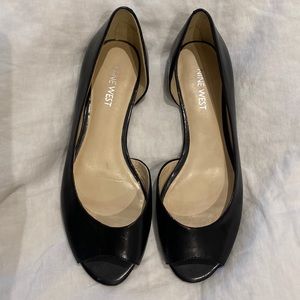 Black peep toe leather flats. Size 6.5.